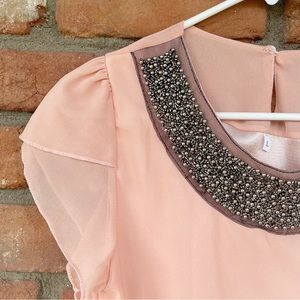 Peach Chiffon Top with Beaded Round Neckline and Crossover Flutter Sleeves
